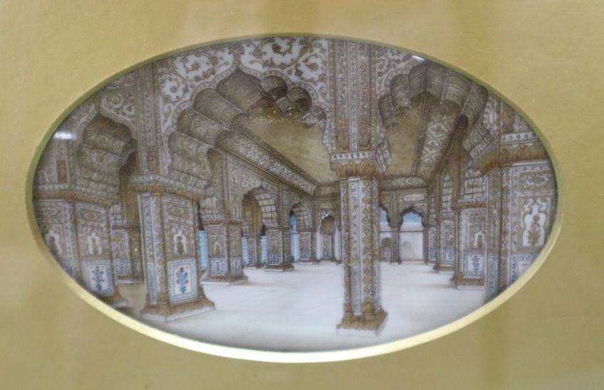 A 19th century Indian oil on ivory miniature - Temple interior, 8 x 13cm oval